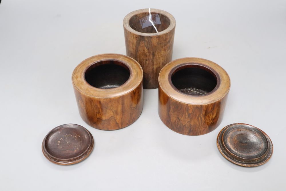 A Chinese huang huali brush pot and two ink jars and covers, 19th century, tallest 11.5cm